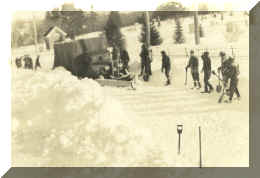 Shoveling snow at the Alfred Camp