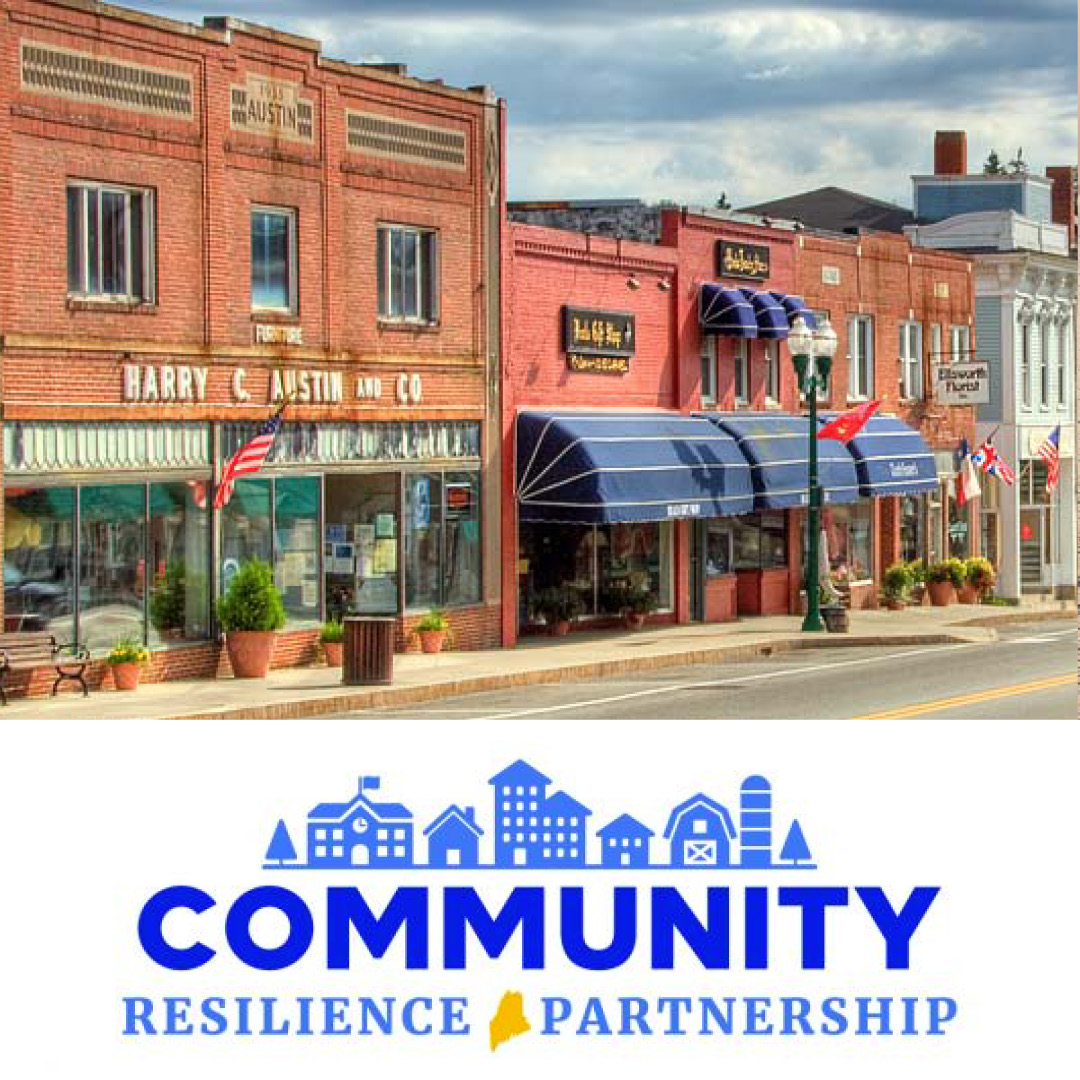 Picture of a street with brick buildings and text reading Community Resilience Partnership