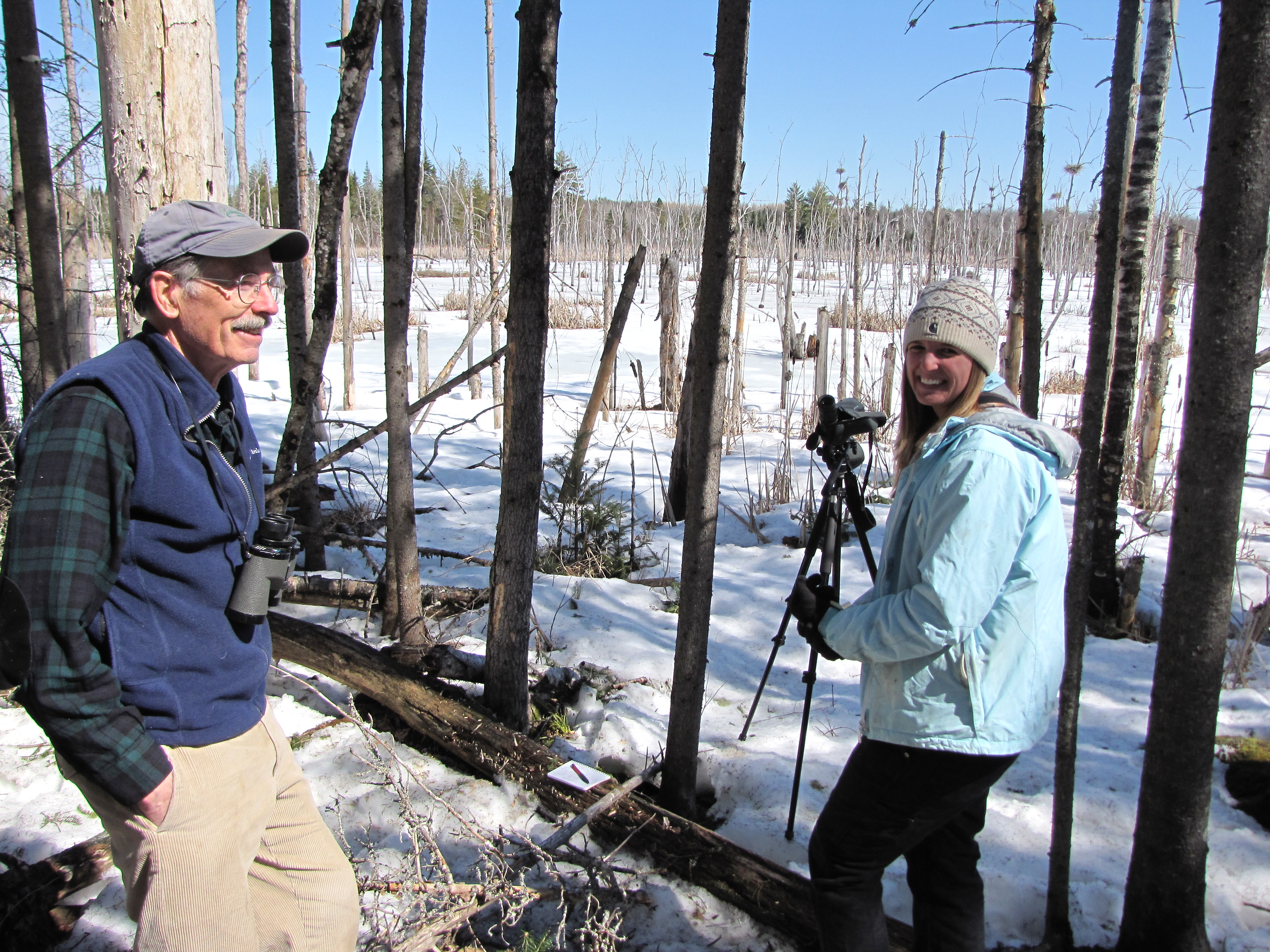 Volunteer, Rick Lawrence and technician, Brittany Currier, making observations from the wetland edge.