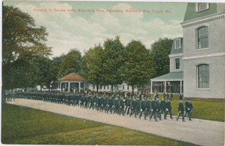 Soliders passing in review at Togus on Memorial Day